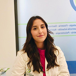 Logo del Centro Medico San Giuseppe: una figura all'interno di un cerchio blu e verde, con testo sottostante.