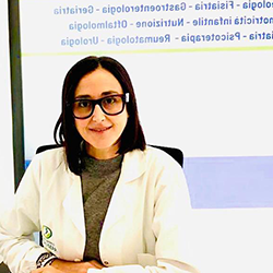 Logo del Centro Medico San Giuseppe: una figura all'interno di un cerchio blu e verde, con testo sottostante.