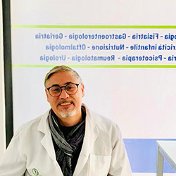 Logo del Centro Medico San Giuseppe: una figura all'interno di un cerchio blu e verde, con testo sottostante.