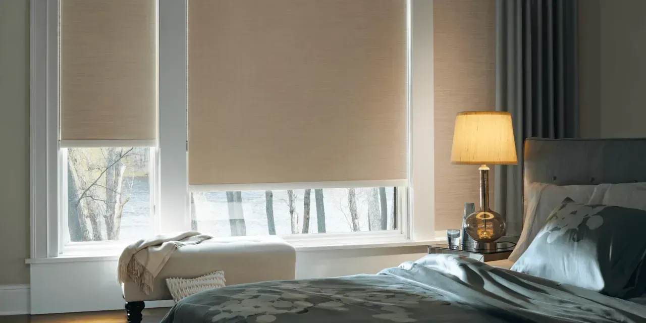 Hunter Douglas roller blackout shades in bedroom
