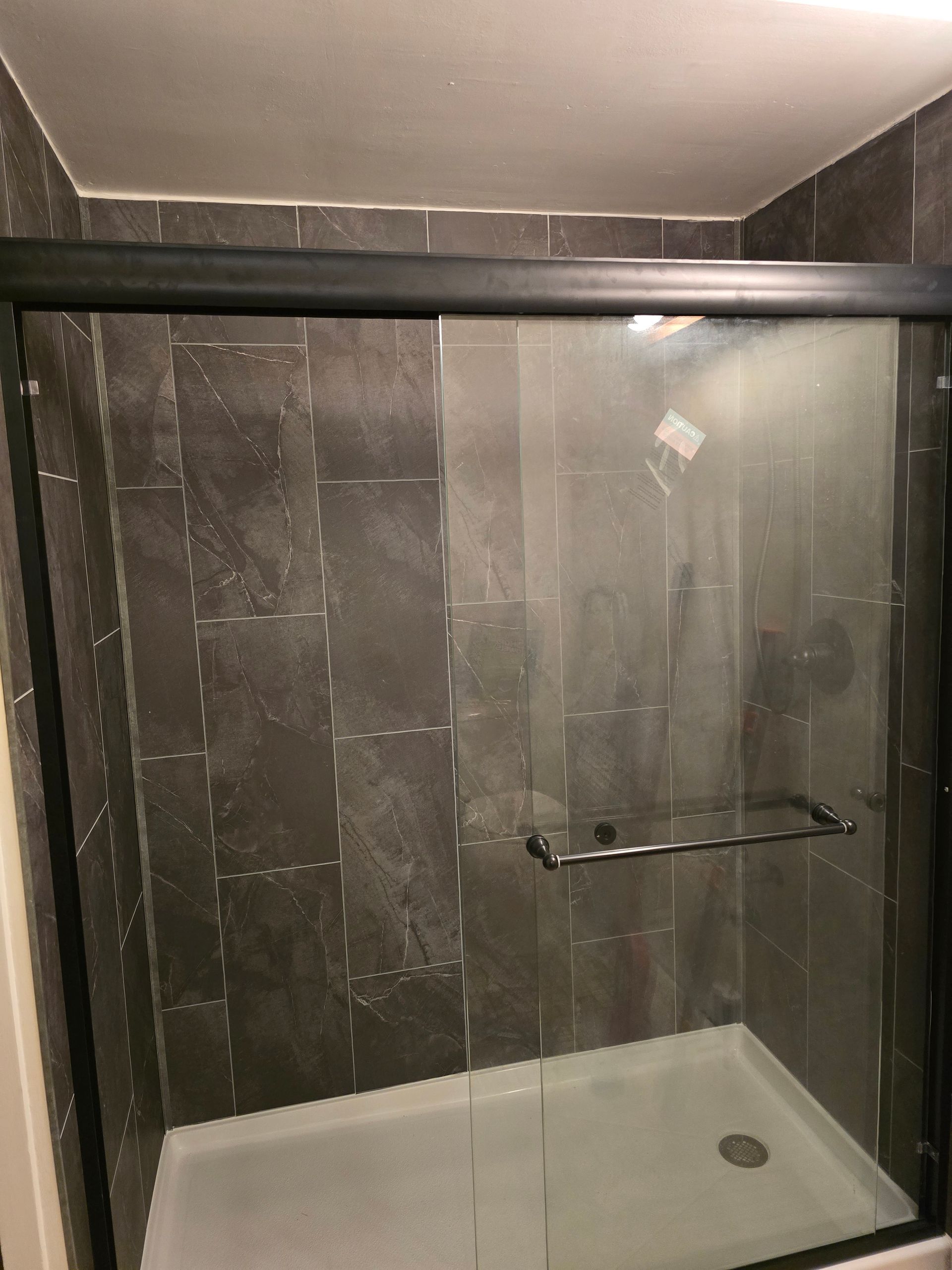 A before and after picture of a bathroom with a sink and toilet.