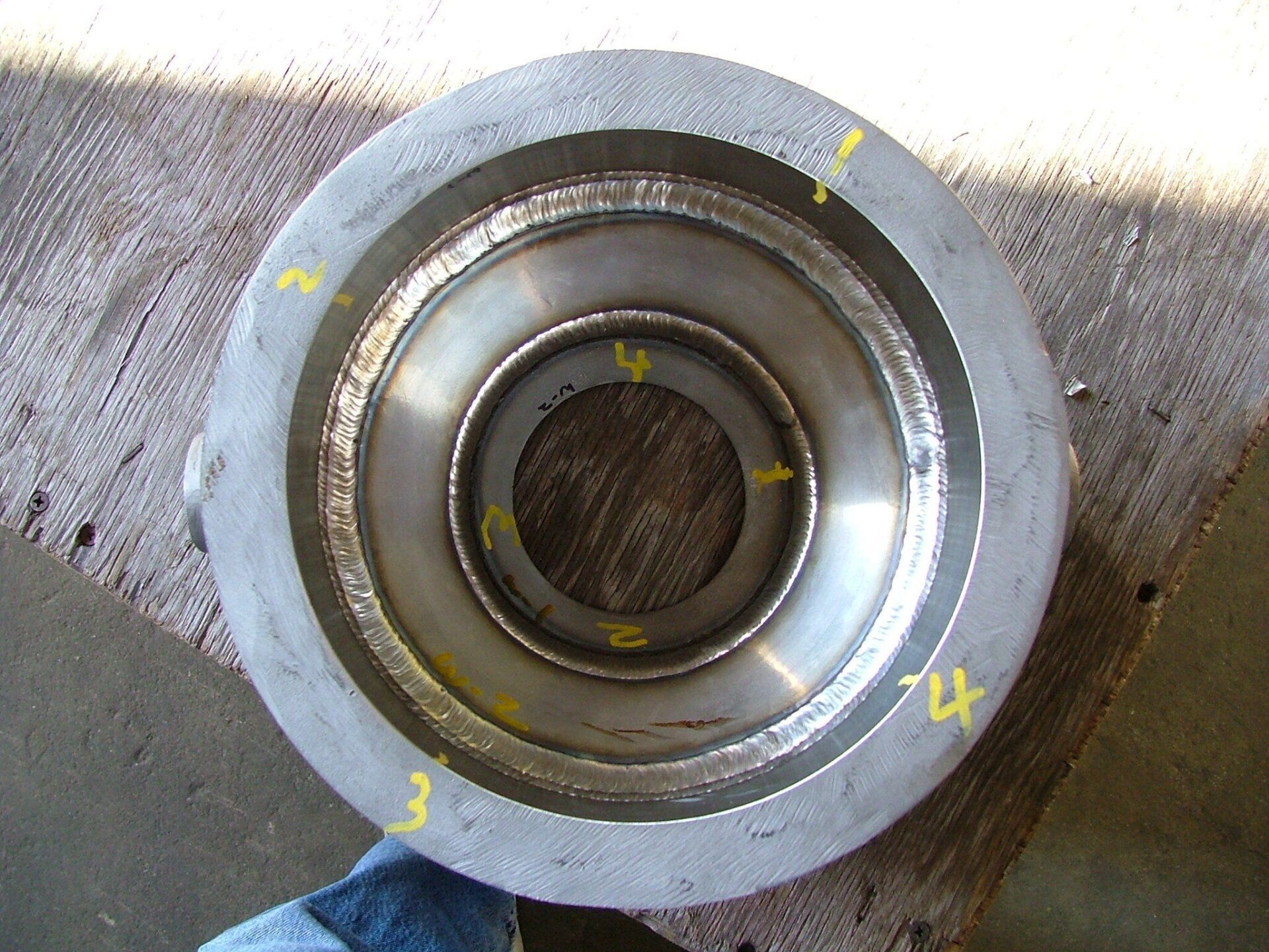 A metal object with the number 3 and 4 on it