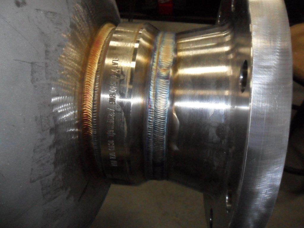 A close up of a piece of metal that says ' stainless steel ' on it