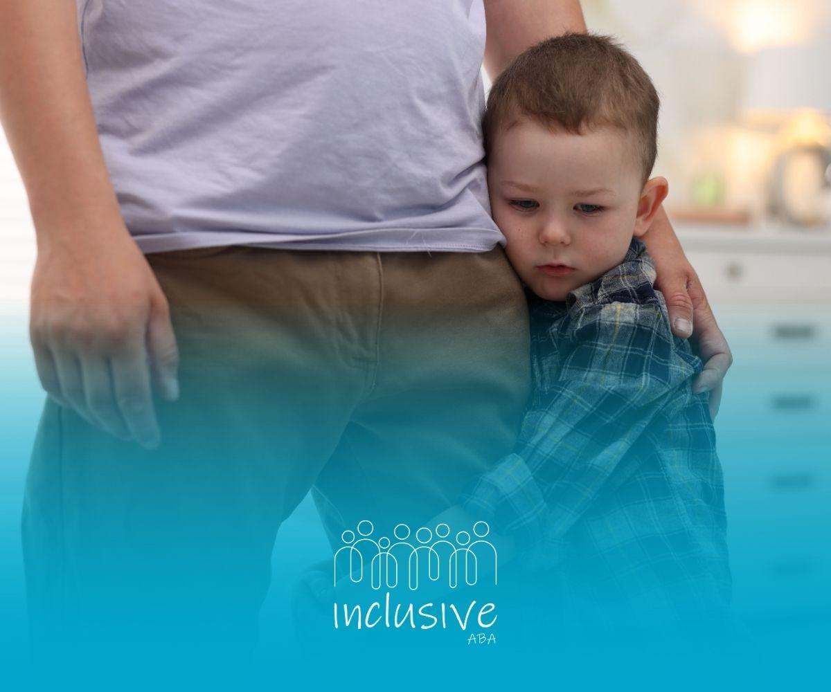 Child hugging a person's legs; child looks sad; light blue gradient.