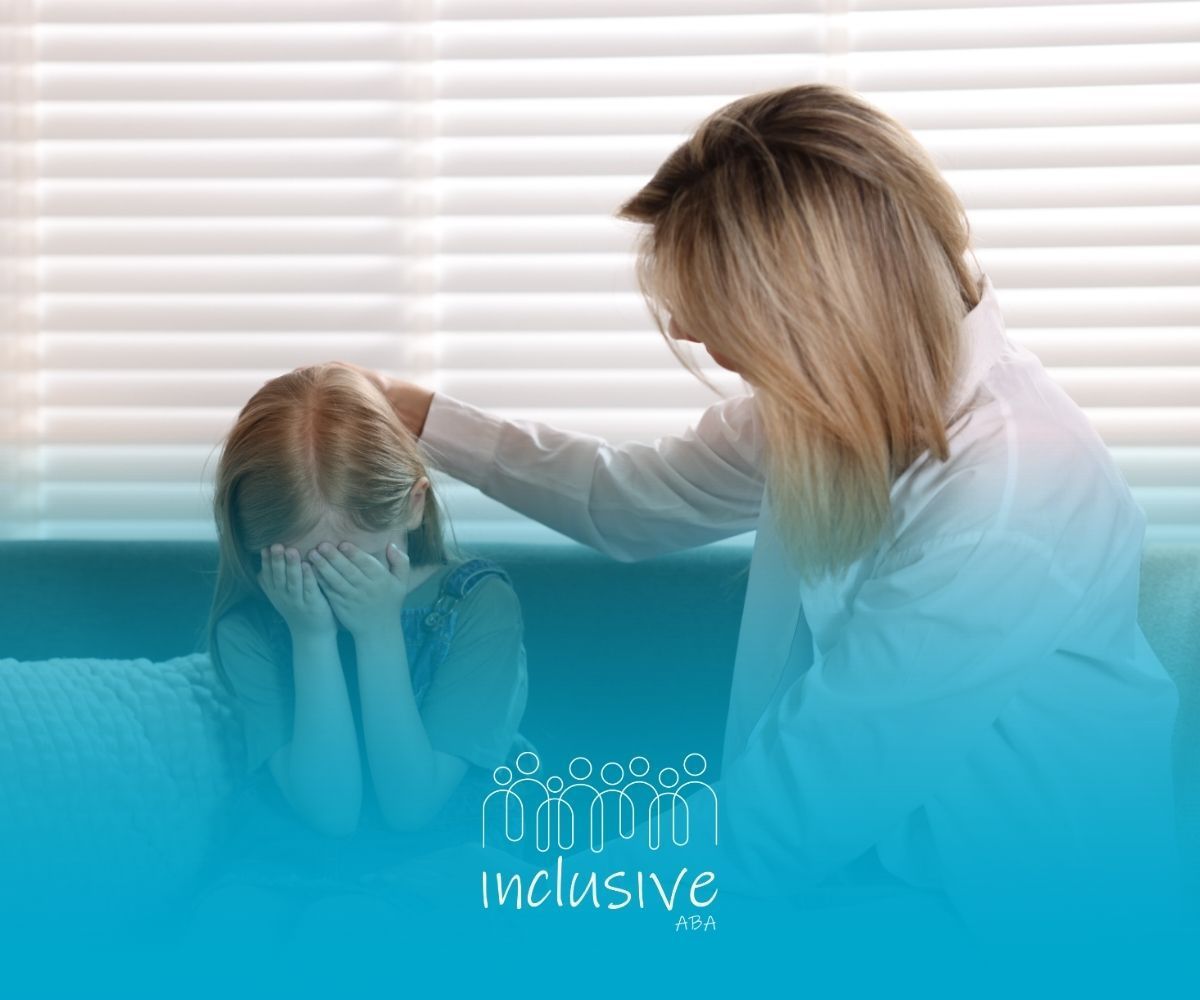 Woman comforts a child; child is crying, covering face with hands. Soft lighting, blue and white tones.