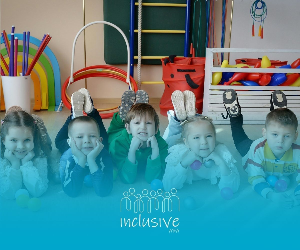 Children with bunny ears and headphones sitting in a colorful classroom, with “inclusive” text below