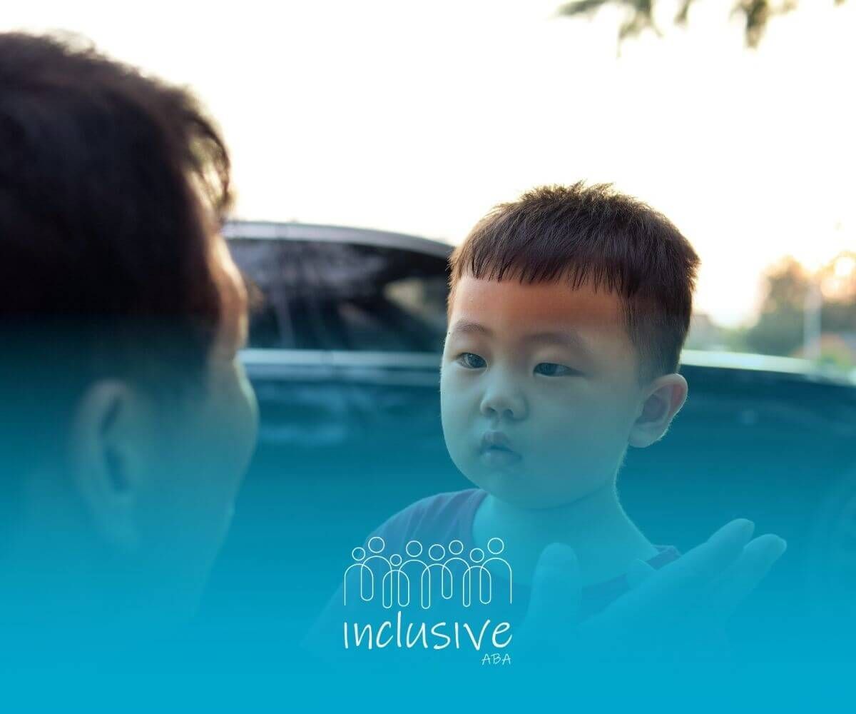 Two autistic girls sitting outside, having a quiet conversation and sharing a treat after therapy.
