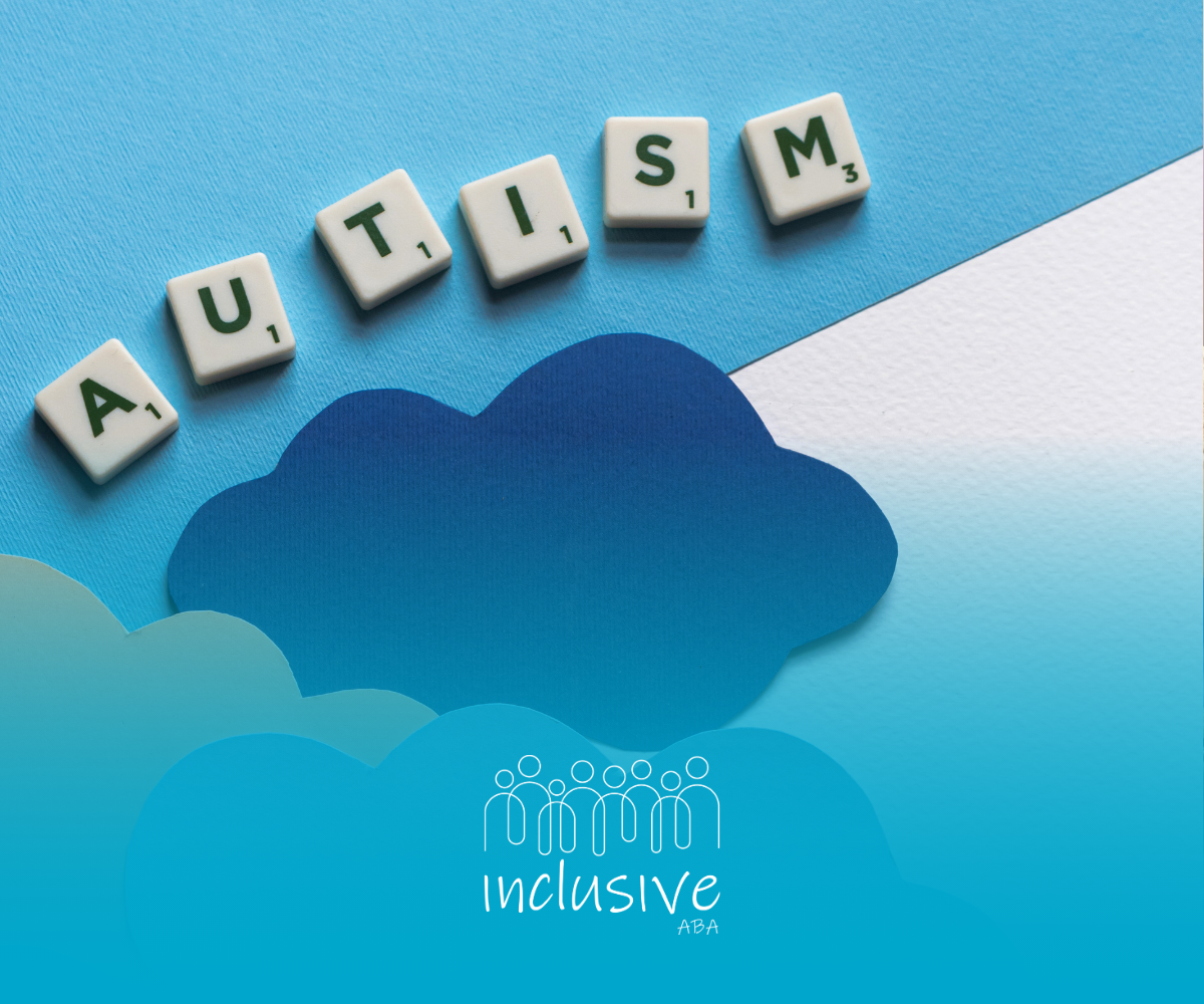 The word autism is written in scrabble blocks on a blue background