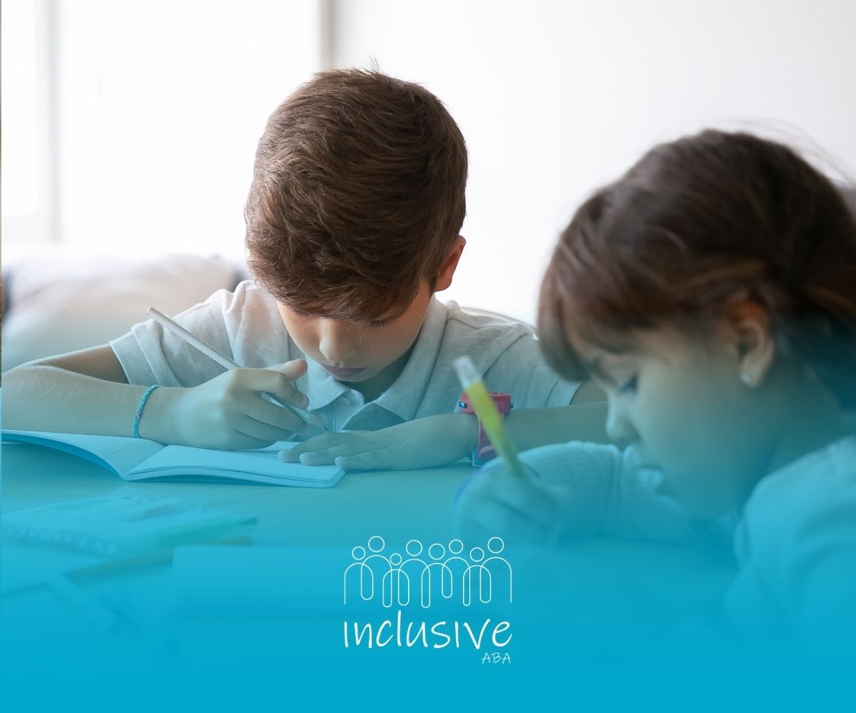 Two children writing at a table, with a blue inclusive banner overlay at the bottom.