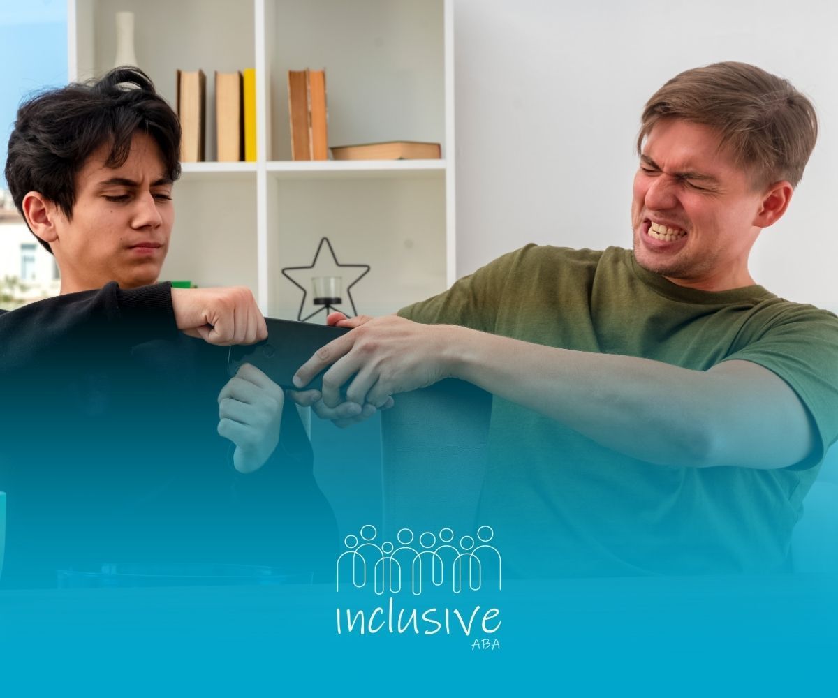 Two boys fighting over a smartphone, showing frustration and tension in their expressions.