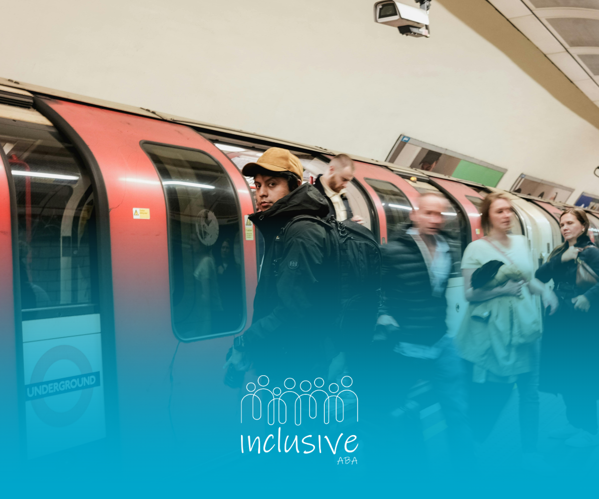 Commuters walk along a platform next to a red London Underground train. 