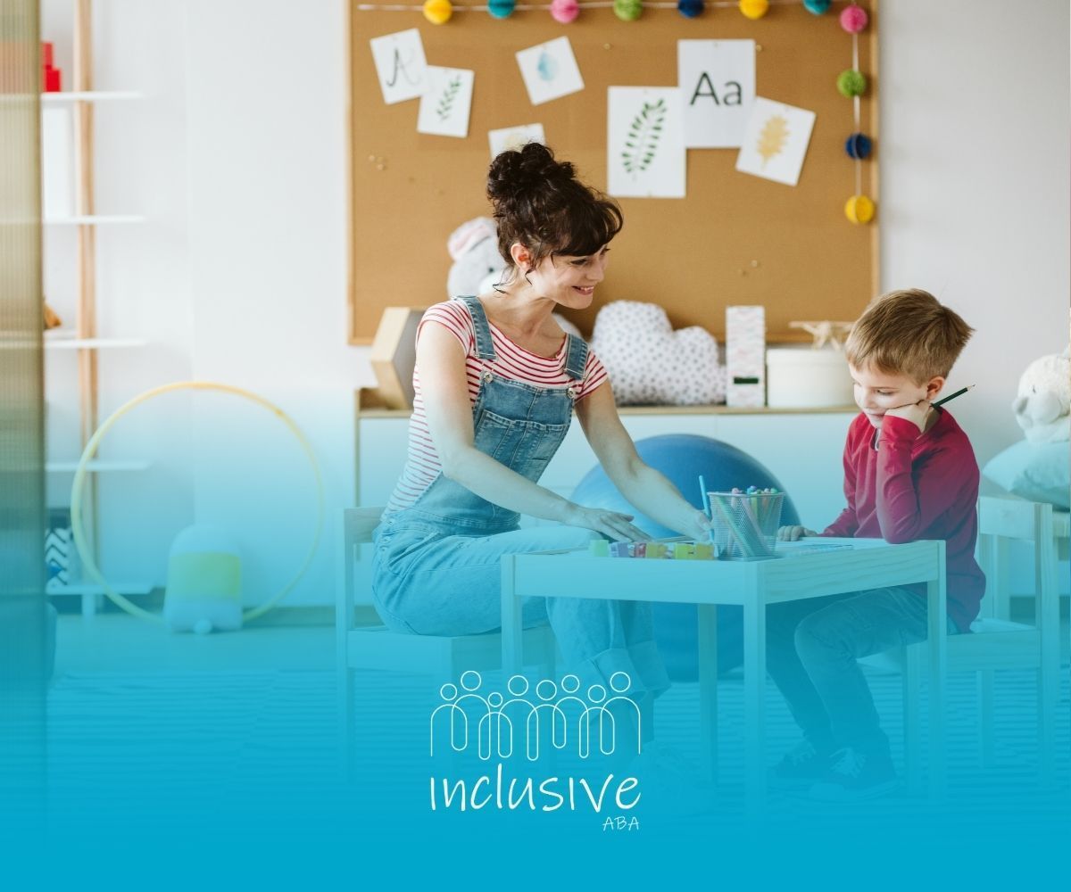 A woman is sitting at a table with a child.