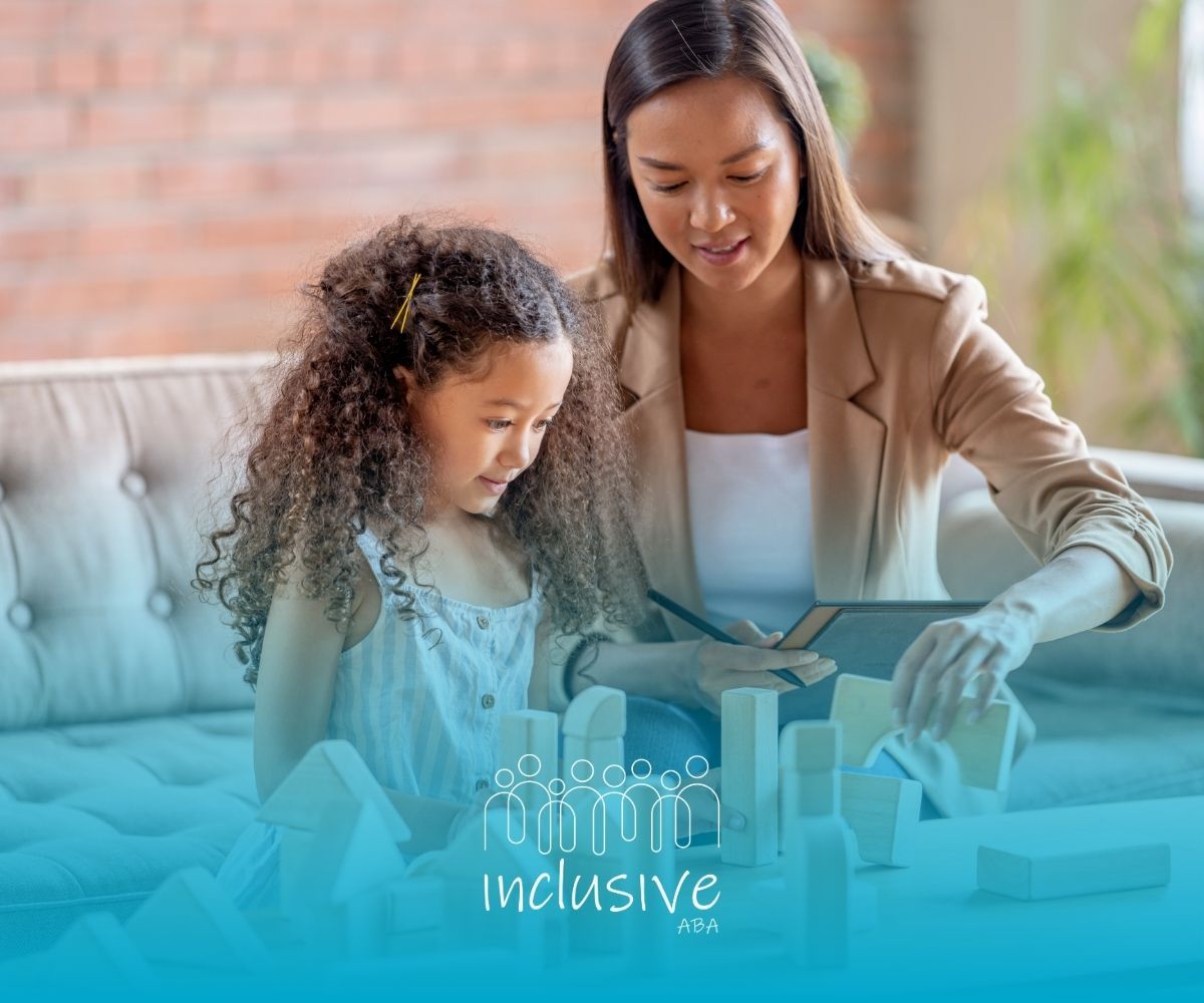 Woman and child opening a gift box on a couch, with a blue “inclusive” graphic overlay.