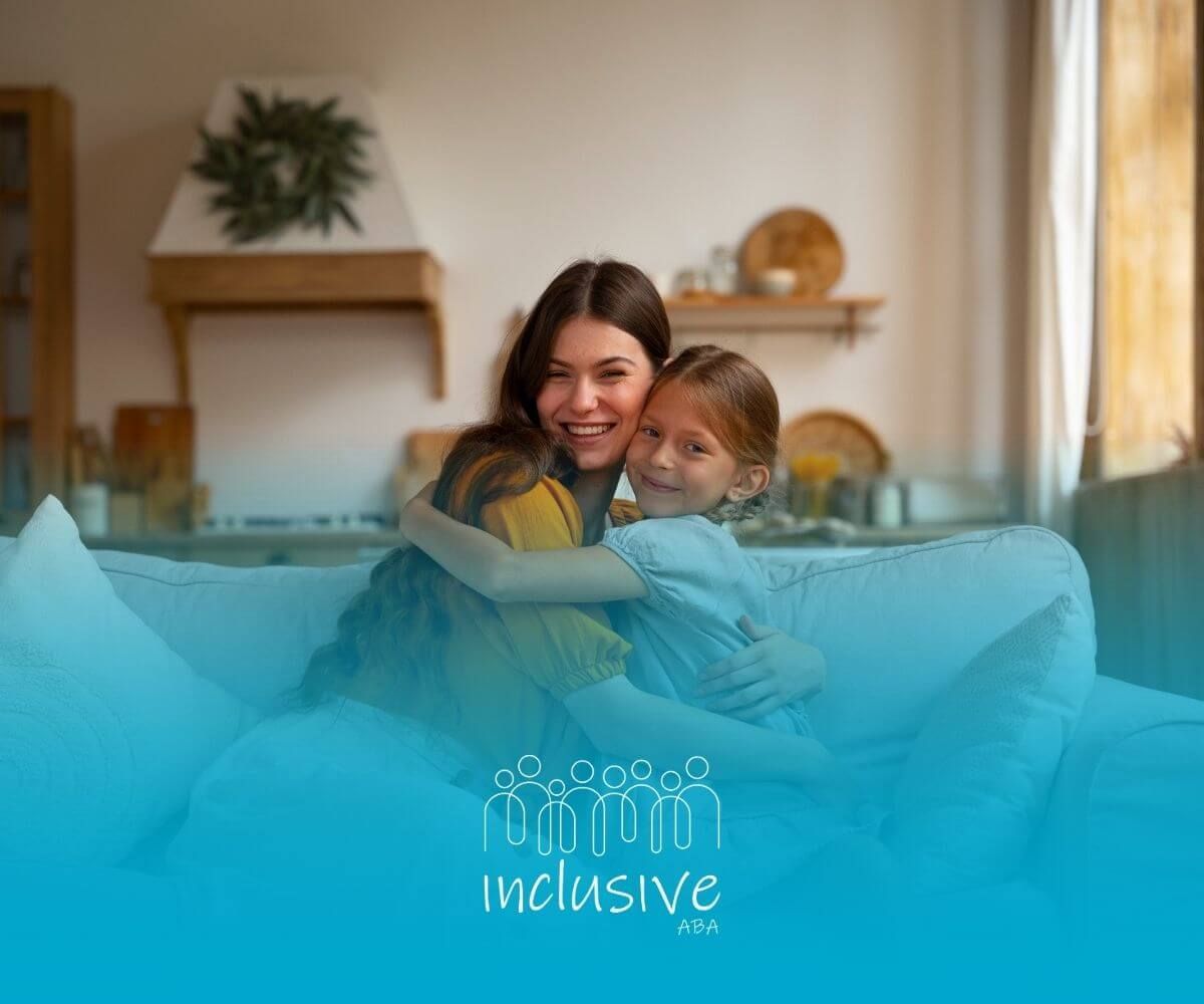 Smiling mother hugging her daughter with autism warmly while sitting together on a couch at home.