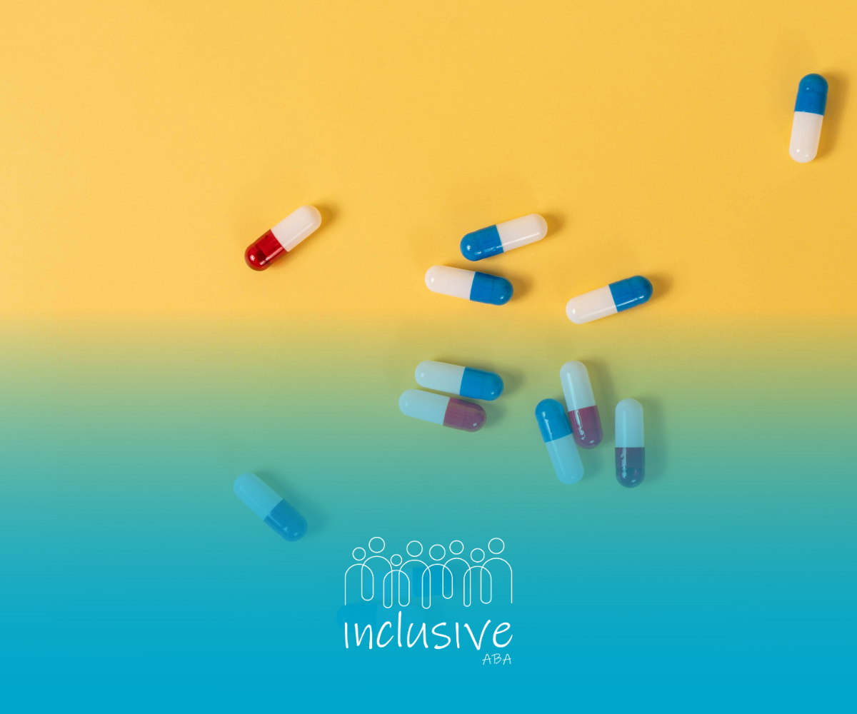 Pills scattered on a two-toned yellow and blue background, likely medication or pharmaceuticals, promoting inclusivity.