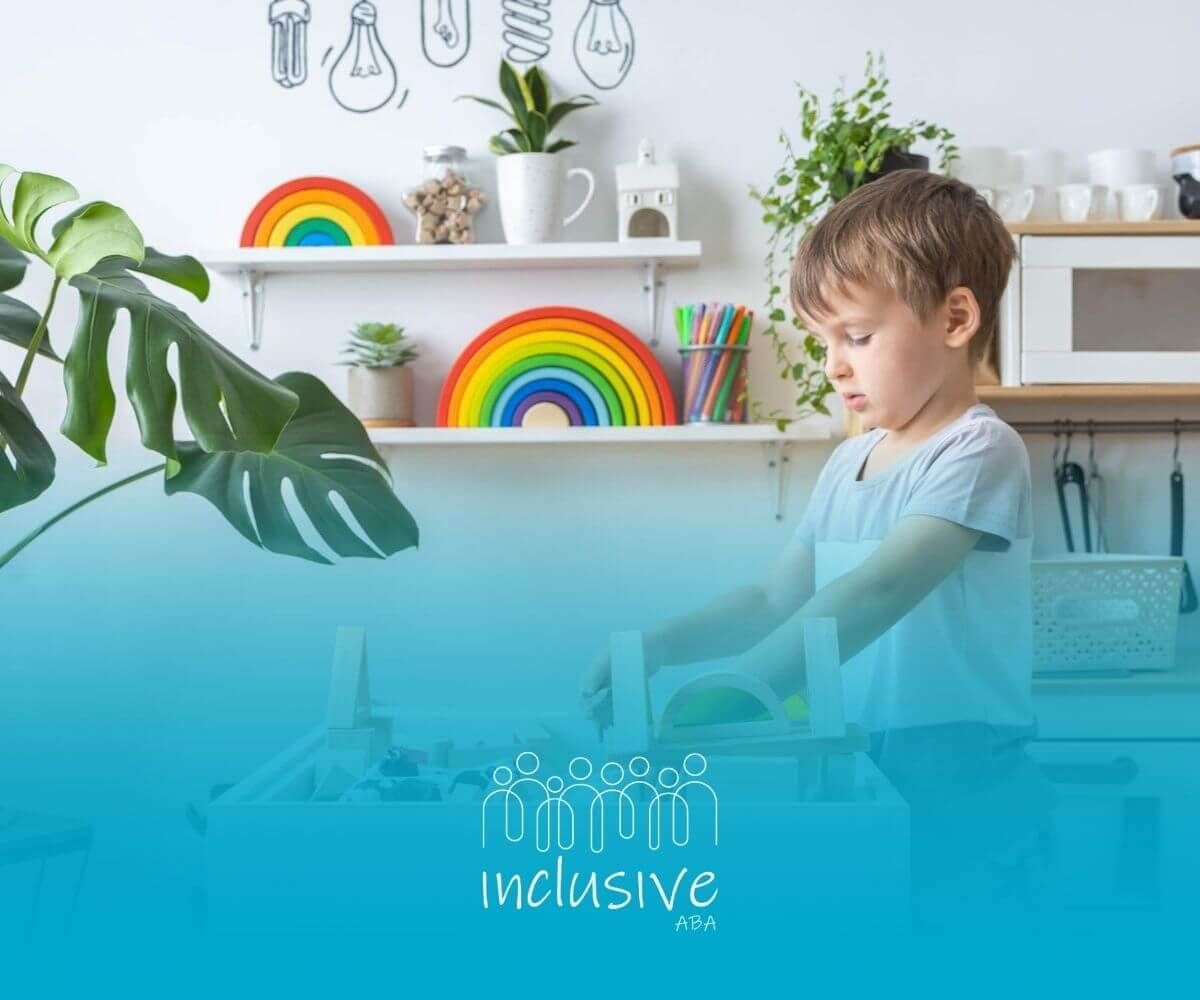 A boy with autism playing with wooden blocks at a table in a bright, modern room.