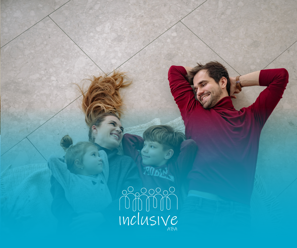 A family of four lying on a tiled floor, smiling at each other, overlaid with the 