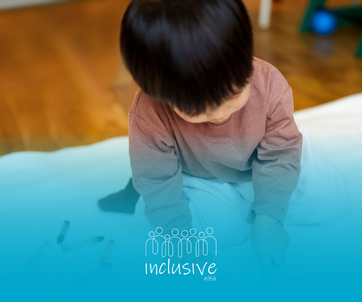 Child drawing on white paper, indoors.