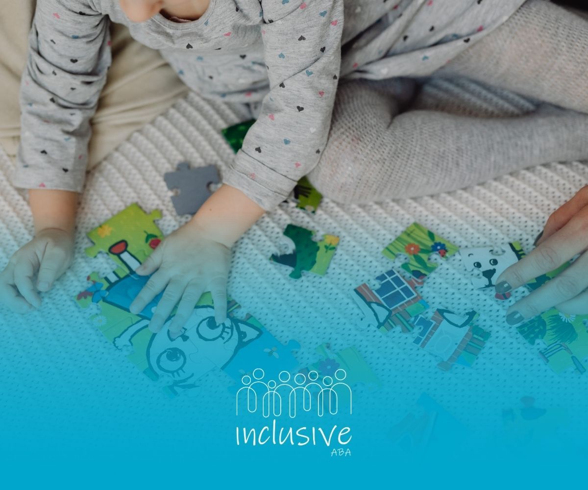 Child playing with a puzzle, hands reaching, on a patterned blanket. Light blue gradient background with