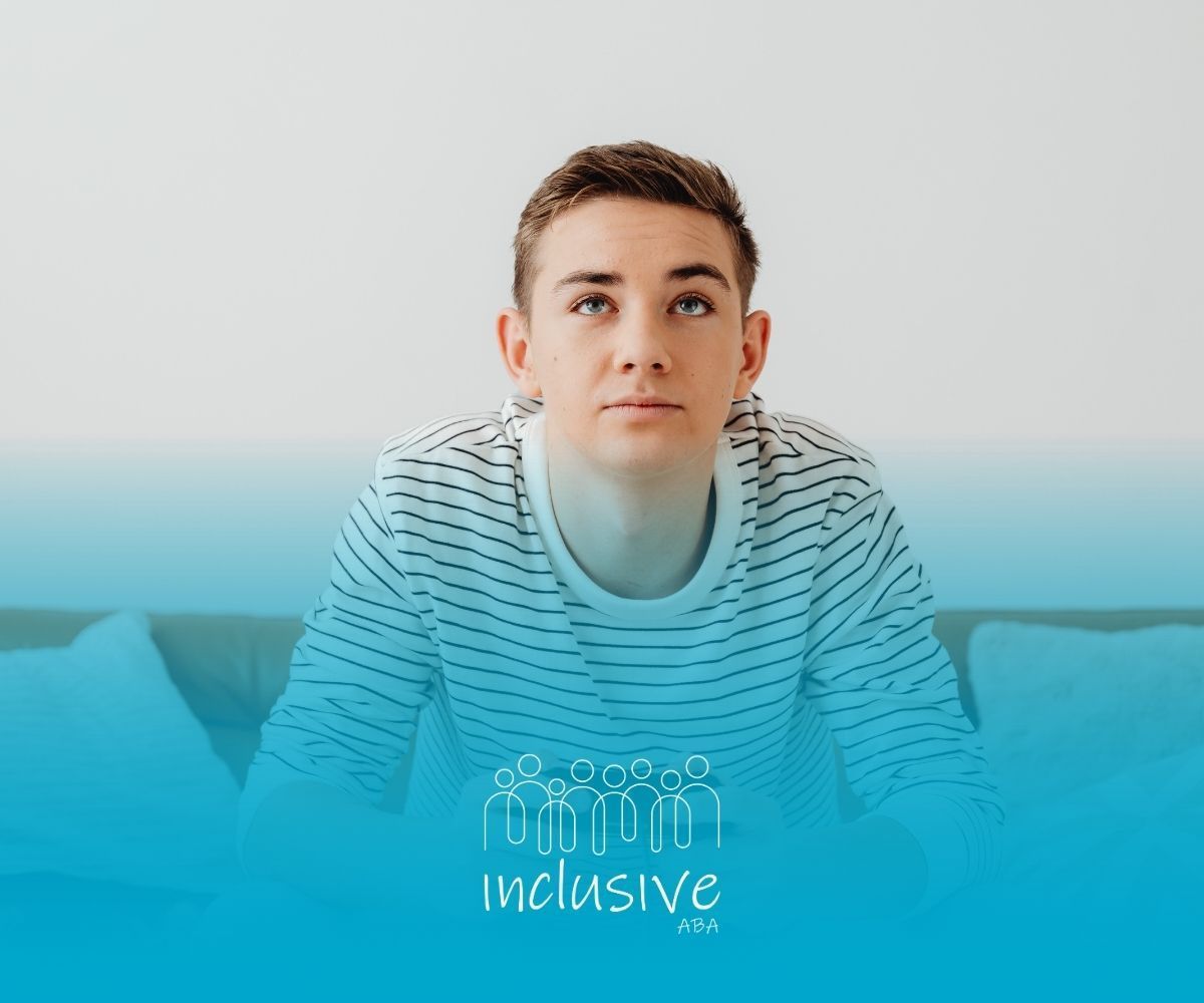 Teenager in striped shirt looking upwards. 