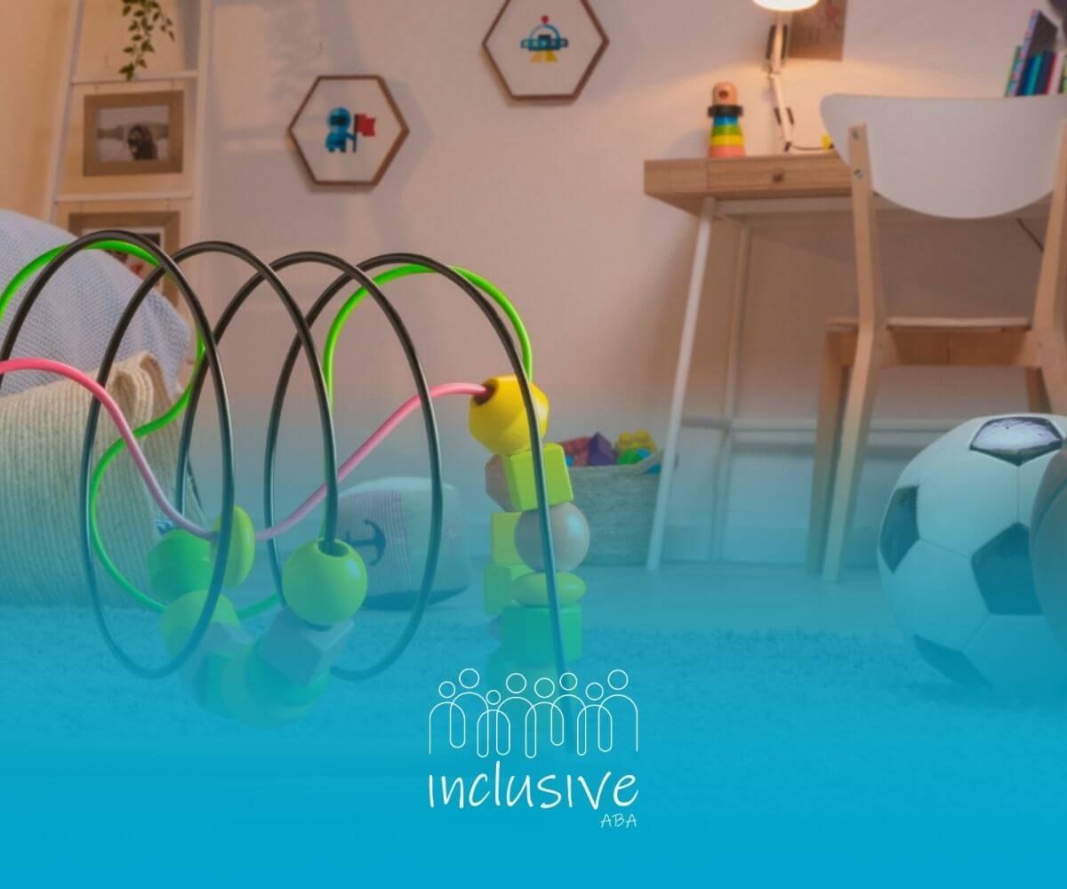 Wooden bead maze toy on carpet in sensory room.