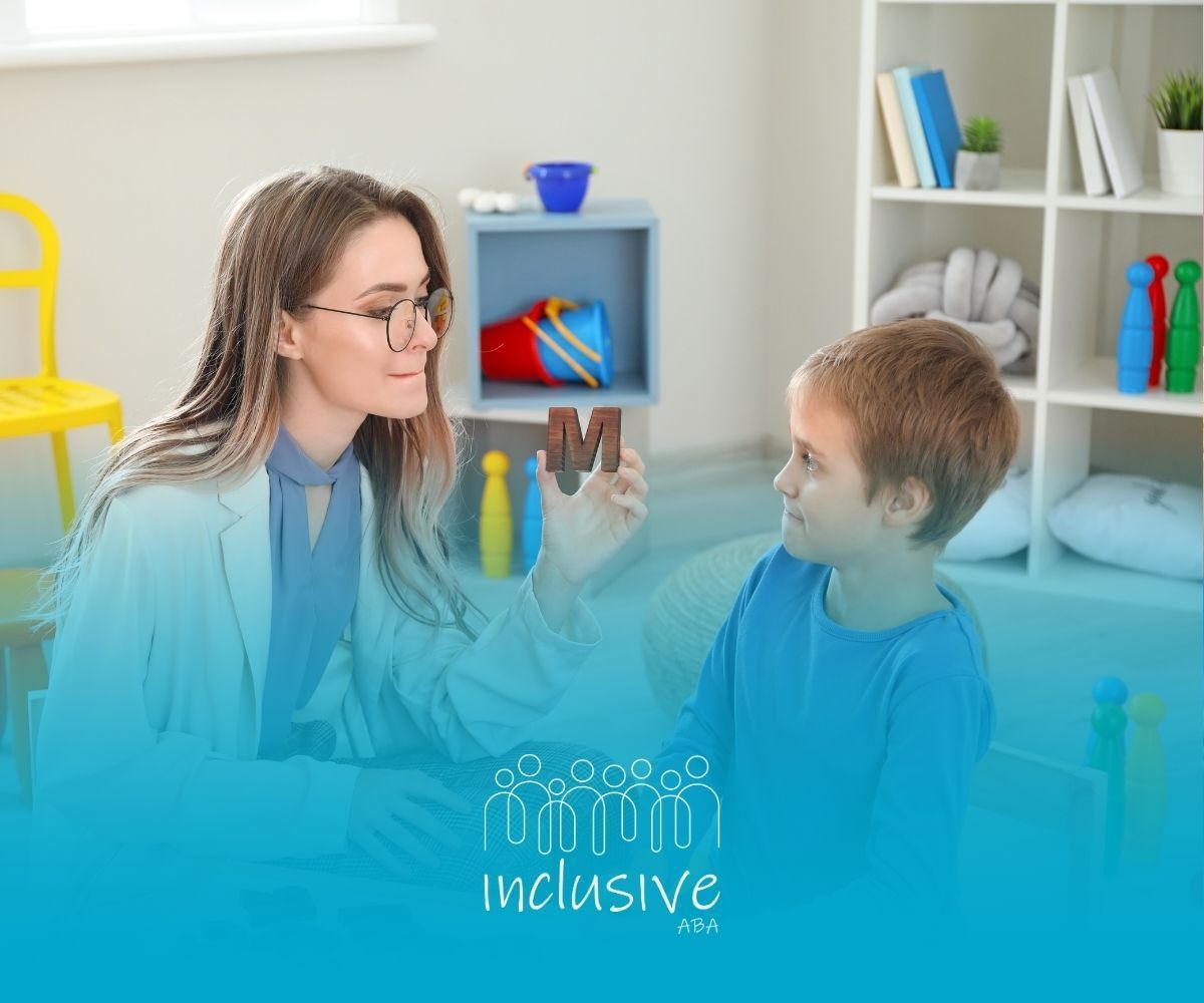 A woman is talking to a young boy in a room.