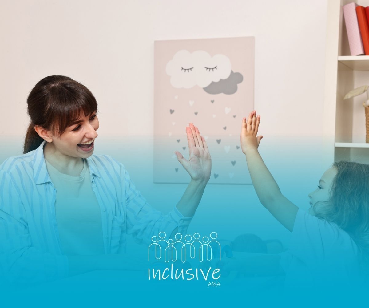 Woman and child high-fiving in a room, pink cloud art in the background.