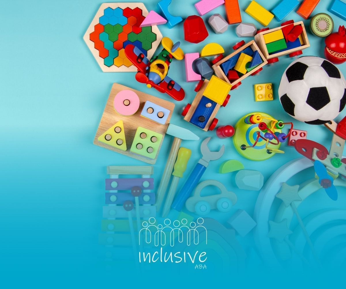 Assortment of colorful children's toys on a light blue background.