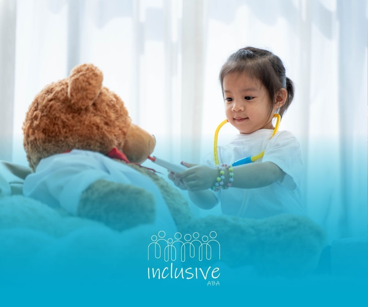 A little girl is playing doctor with a teddy bear.
