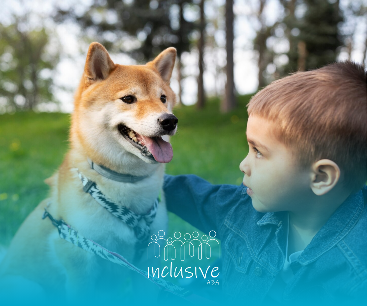 A young boy is petting a dog in a park.