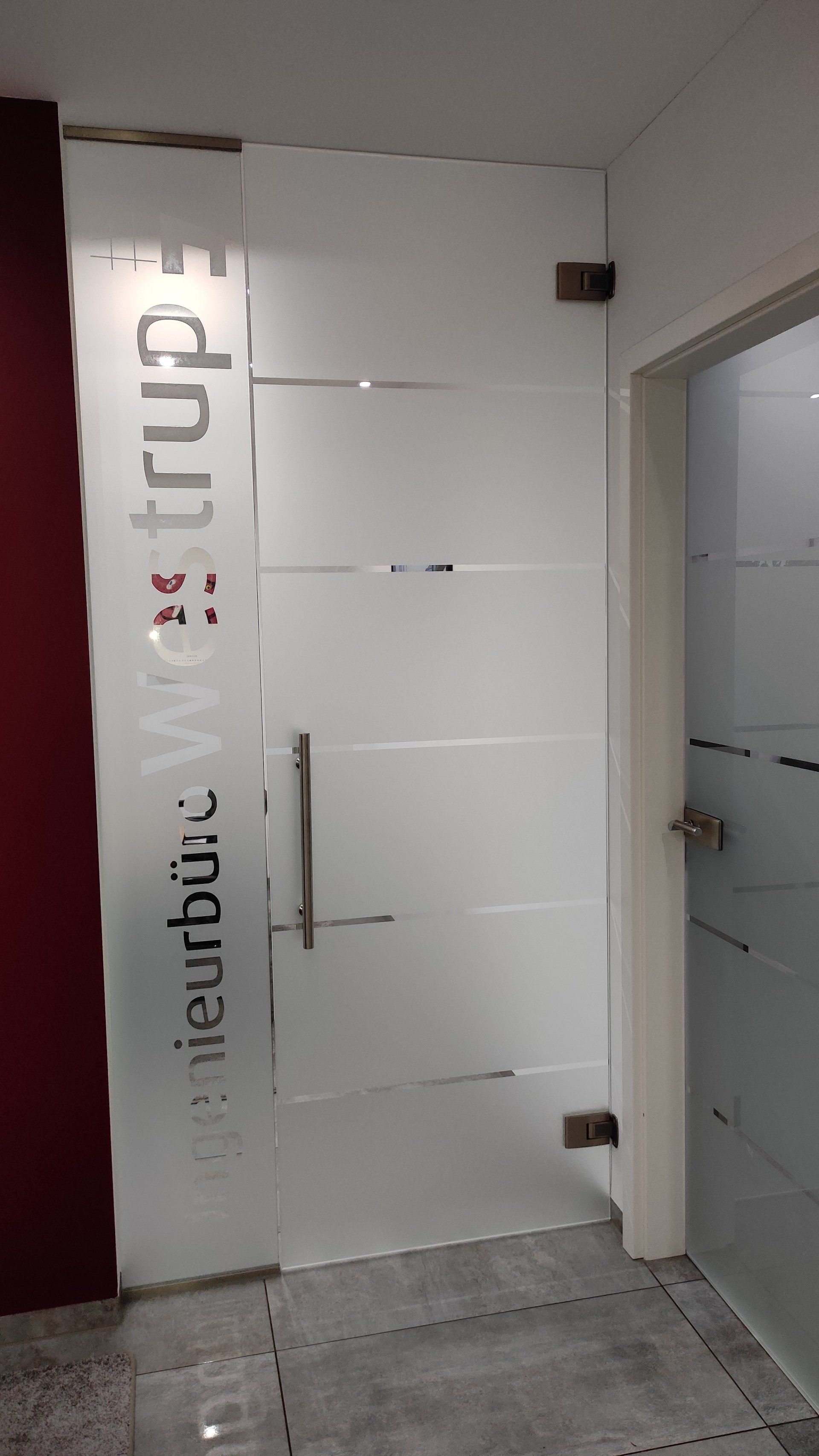 A door with a sticker on it that says ' antwerp ' on it.
