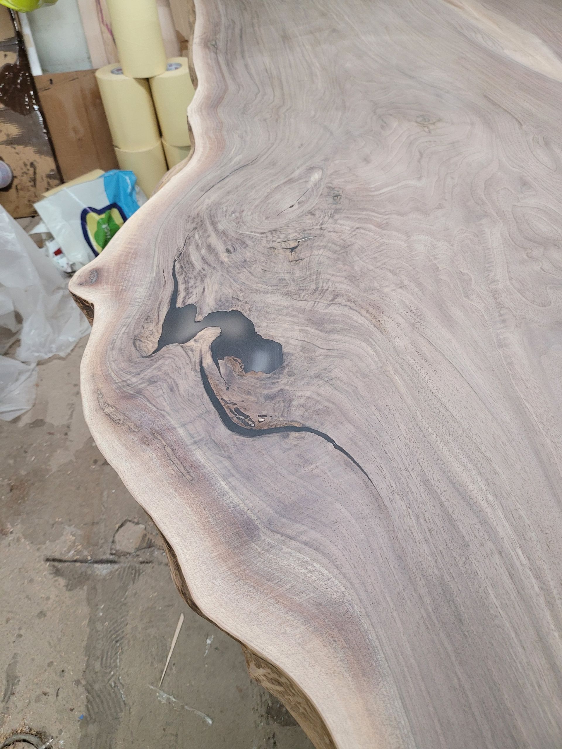 A close up of a piece of wood with a hole in it