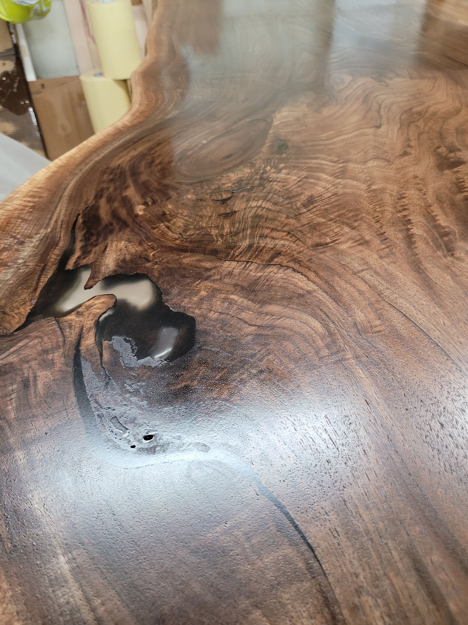 A close up of a piece of wood with a hole in it.