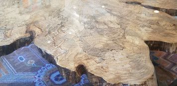 A close up of a skull on a table.