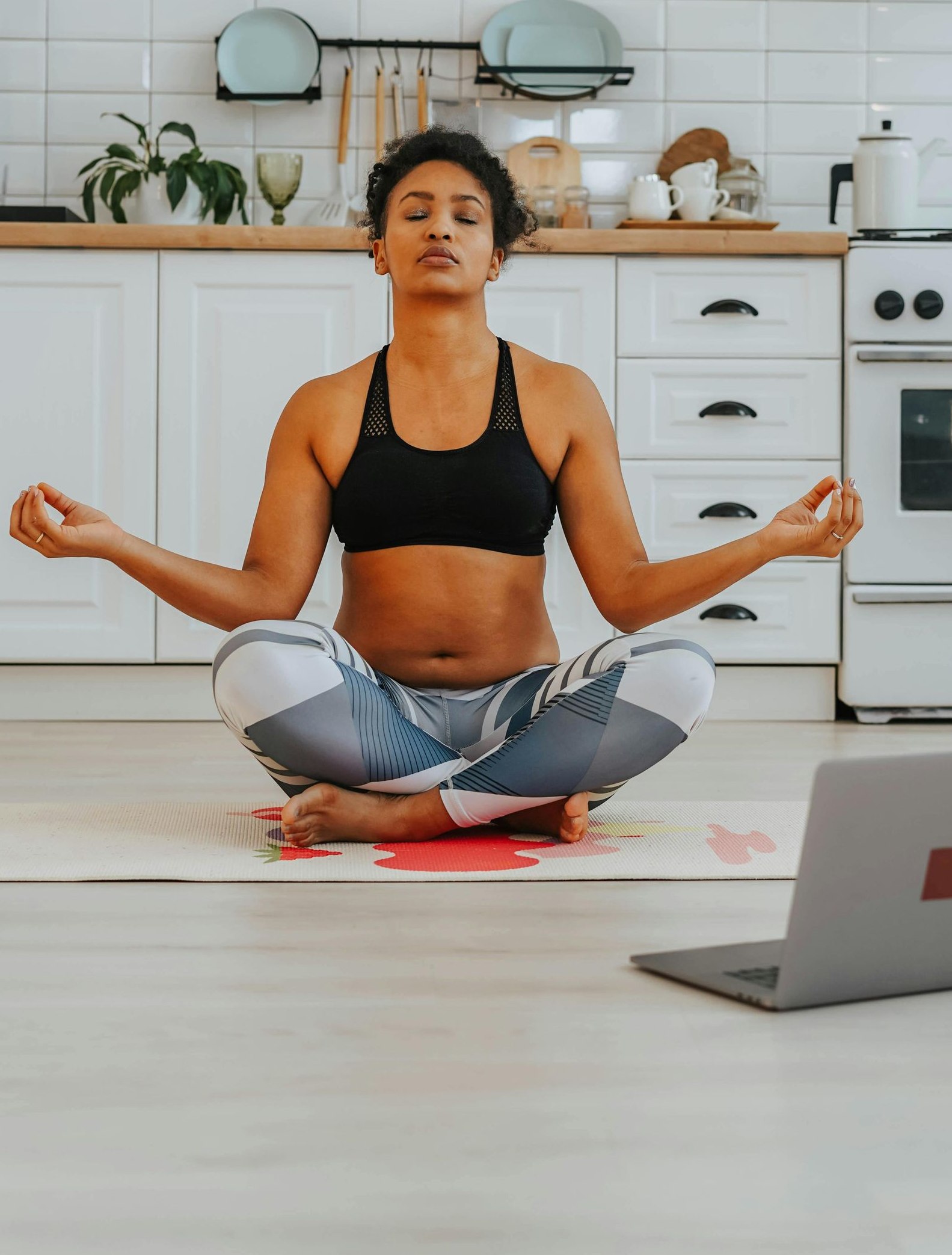 Patrice in a seated twist at Fireside Yoga