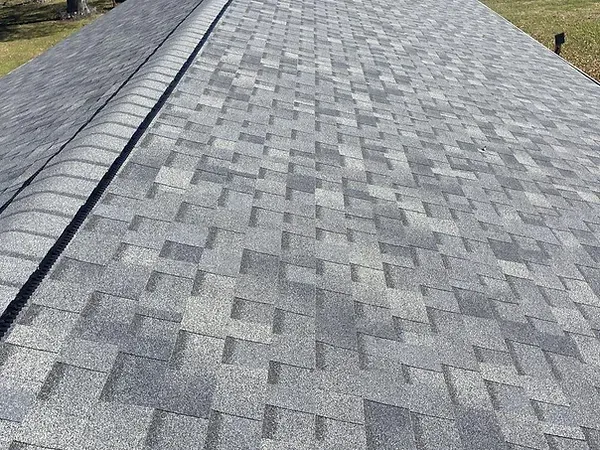 A close up of a roof with shingles on it.