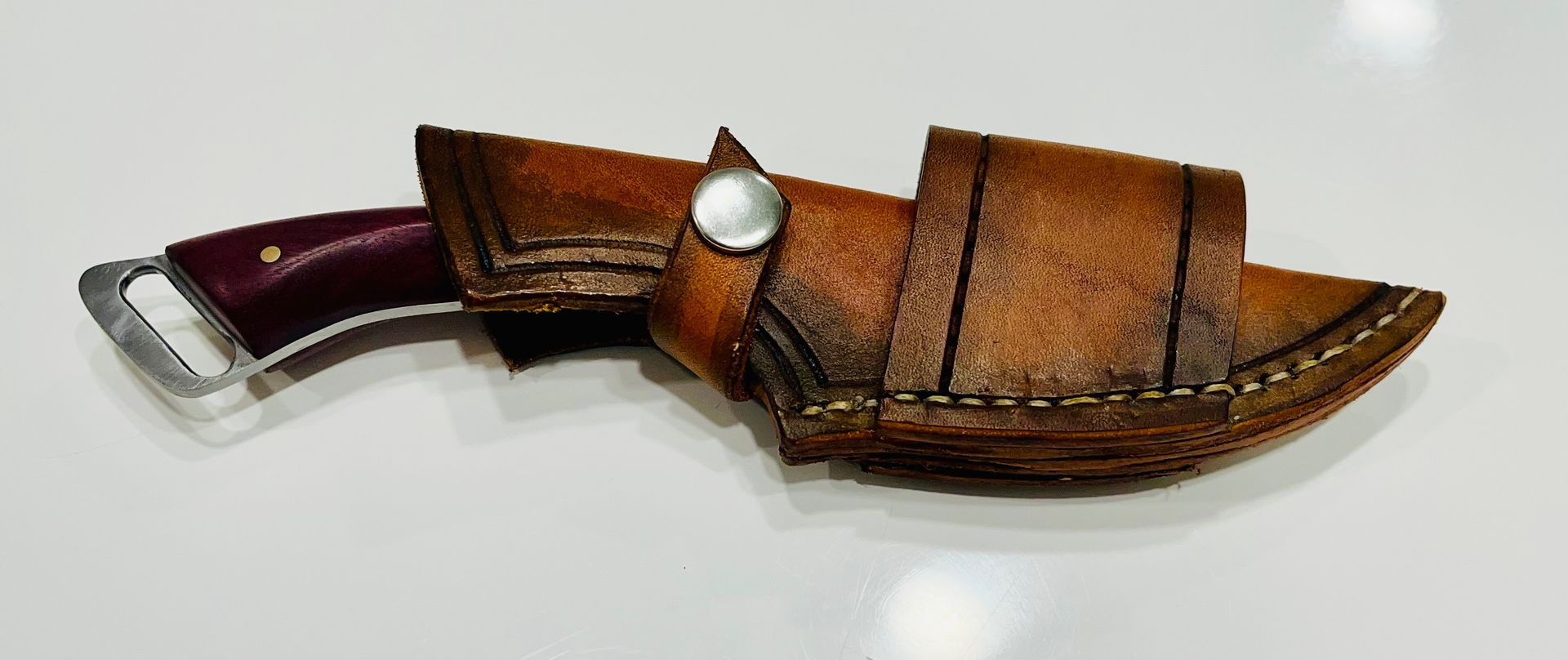 hand crafted leather sheaths, custom fit