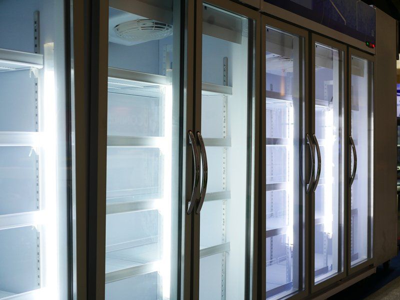 Empty Grocery Refrigerator — Cairo, GA — Parker’s Heating & Cooling, Inc.