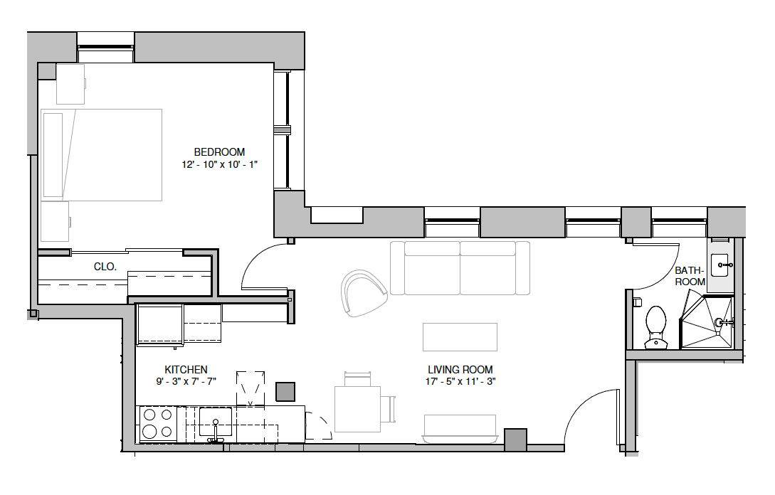Floor plan of an apartment with kitchen/dining, living room, bedroom, and bathroom.