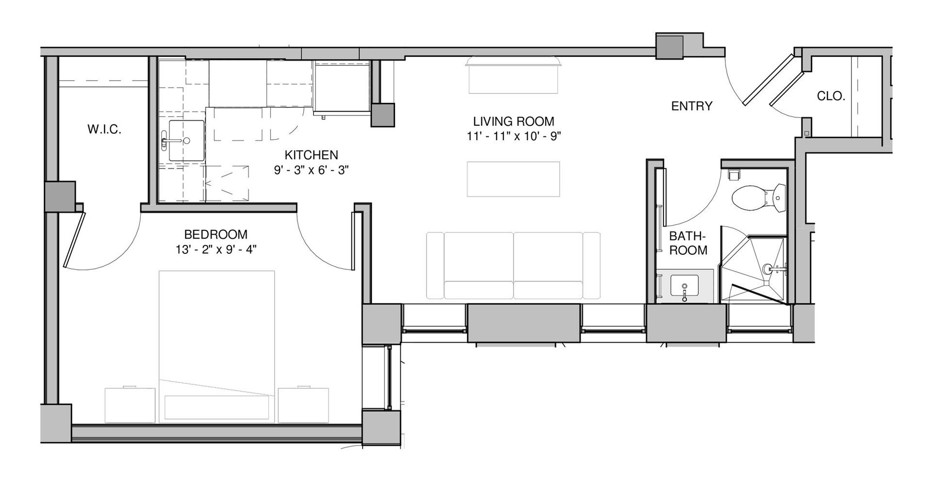 Floor plan of an apartment with kitchen/dining, living room, bedroom, and bathroom.