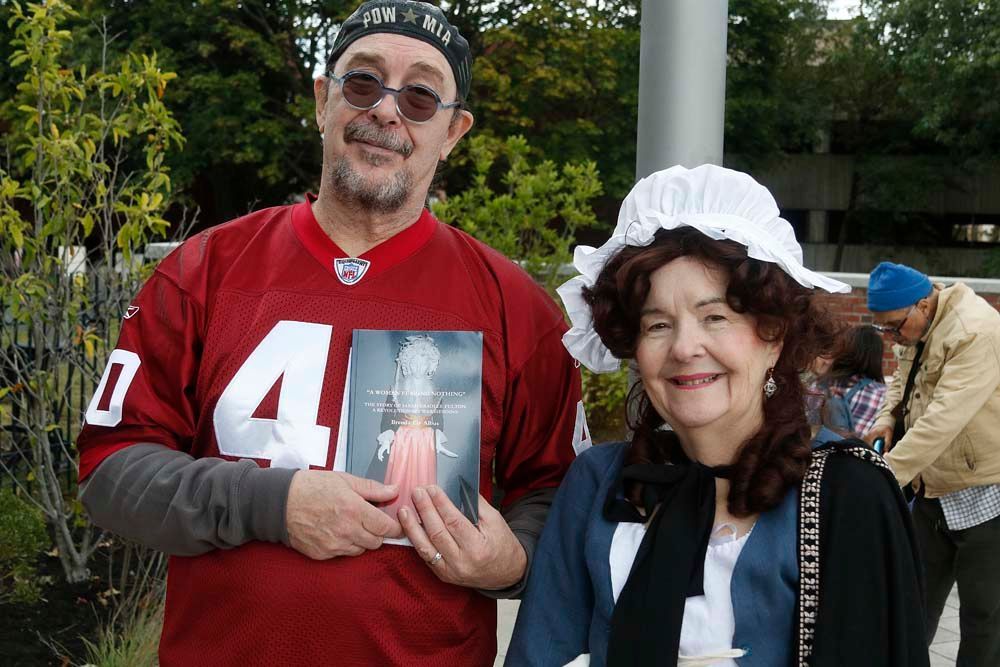 A man in a red jersey with the number 4 on it