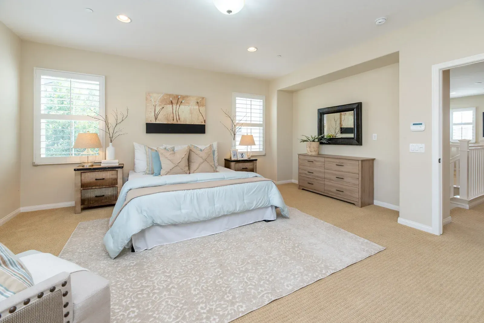 There is a large bed in the middle of the room.