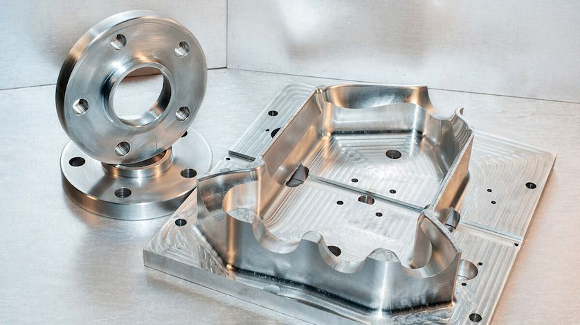 Machined aluminum parts requiring precise anodizing thickness measurement.