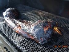 Half a pig on grill