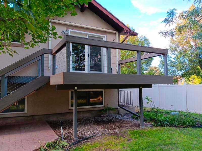 A house with a deck and stairs