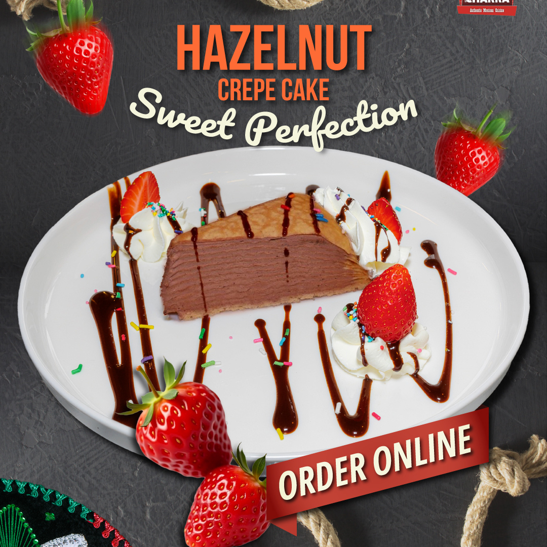 Hazelnut crepe cake with strawberries and chocolate drizzle. Order online.