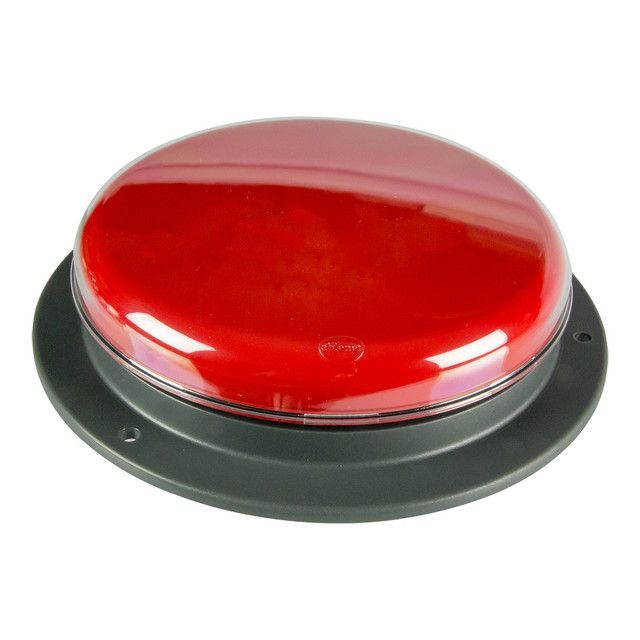 Large, red button with a clear plastic cover on a dark gray base.