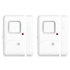 Two white door/window sensors with a red indicator light and a button.