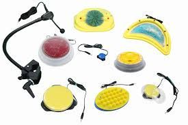 Collection of assistive technology switches in various shapes and colors for accessibility.