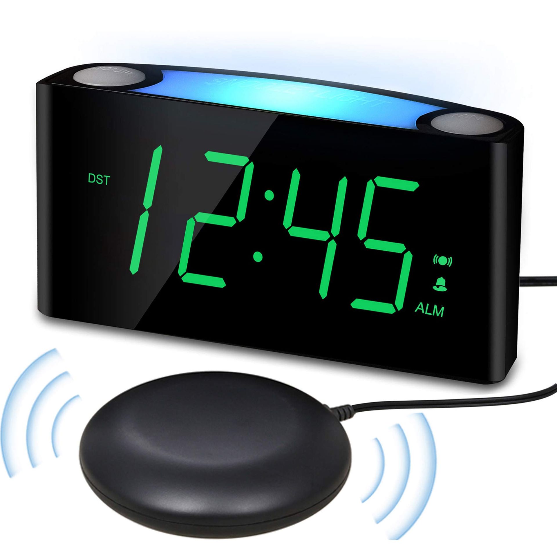 Black digital alarm clock with a green LED display, a vibrating pad, and blue backlight.